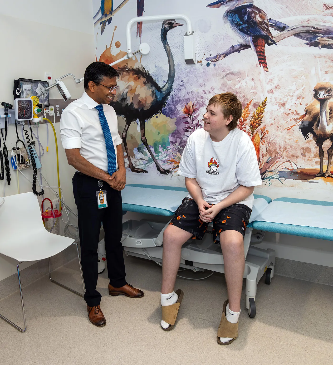 Dr Santosh Valvi in a consultation with an adolescent cancer patient.