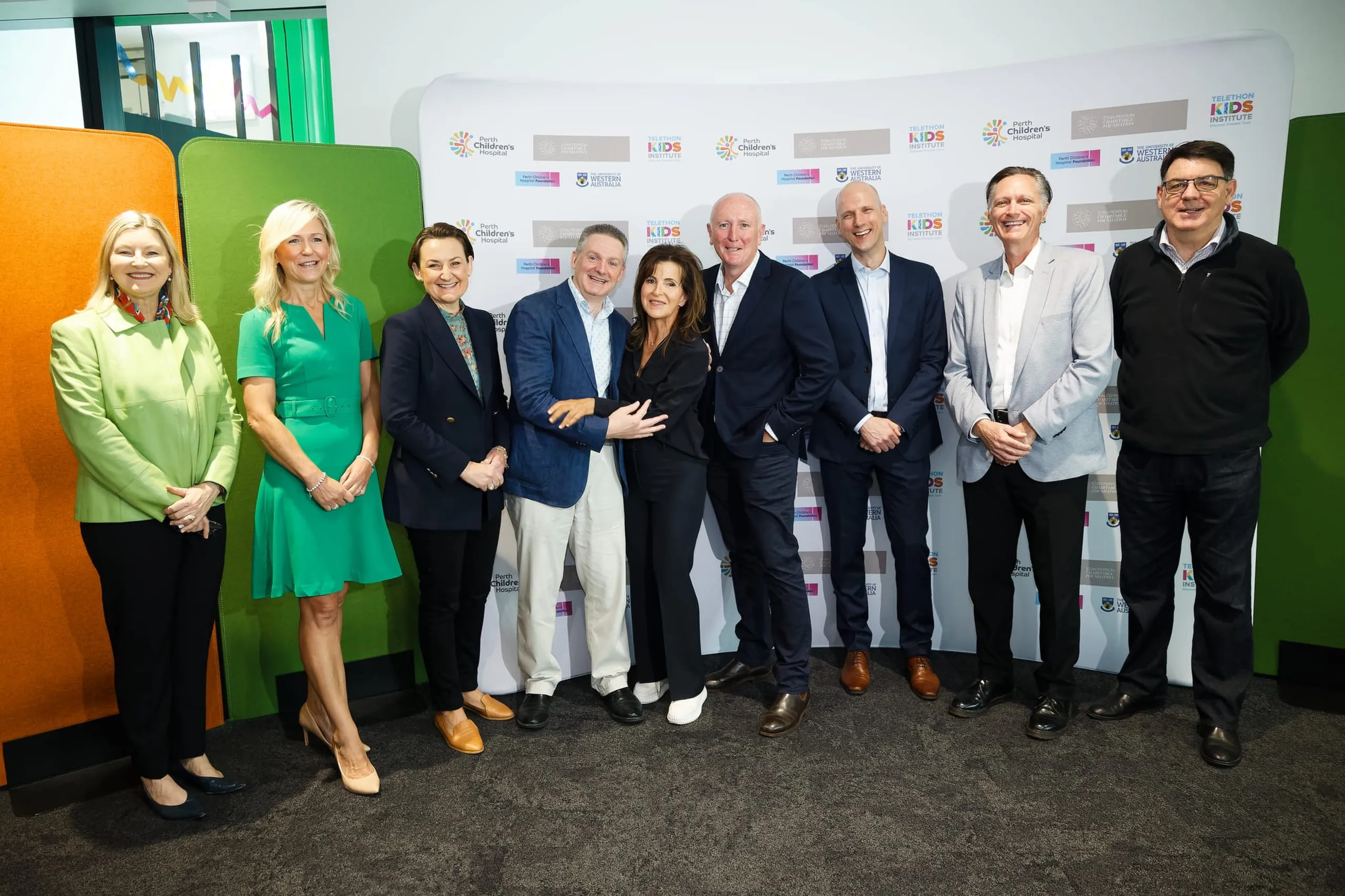 A group of people posing for a photo at the WA Comprehensive Kids Cancer Centre launch event