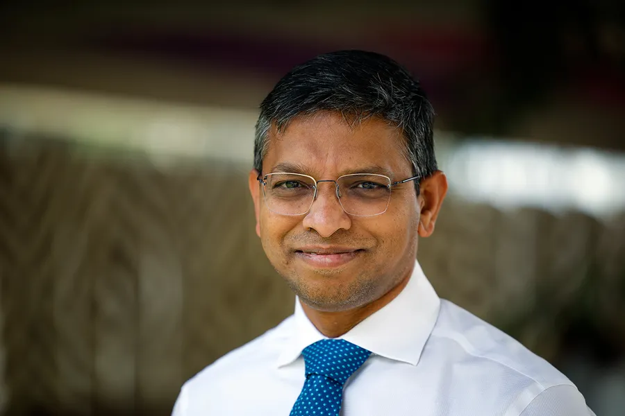 Dr Santosh Valvi smiling at the camera
