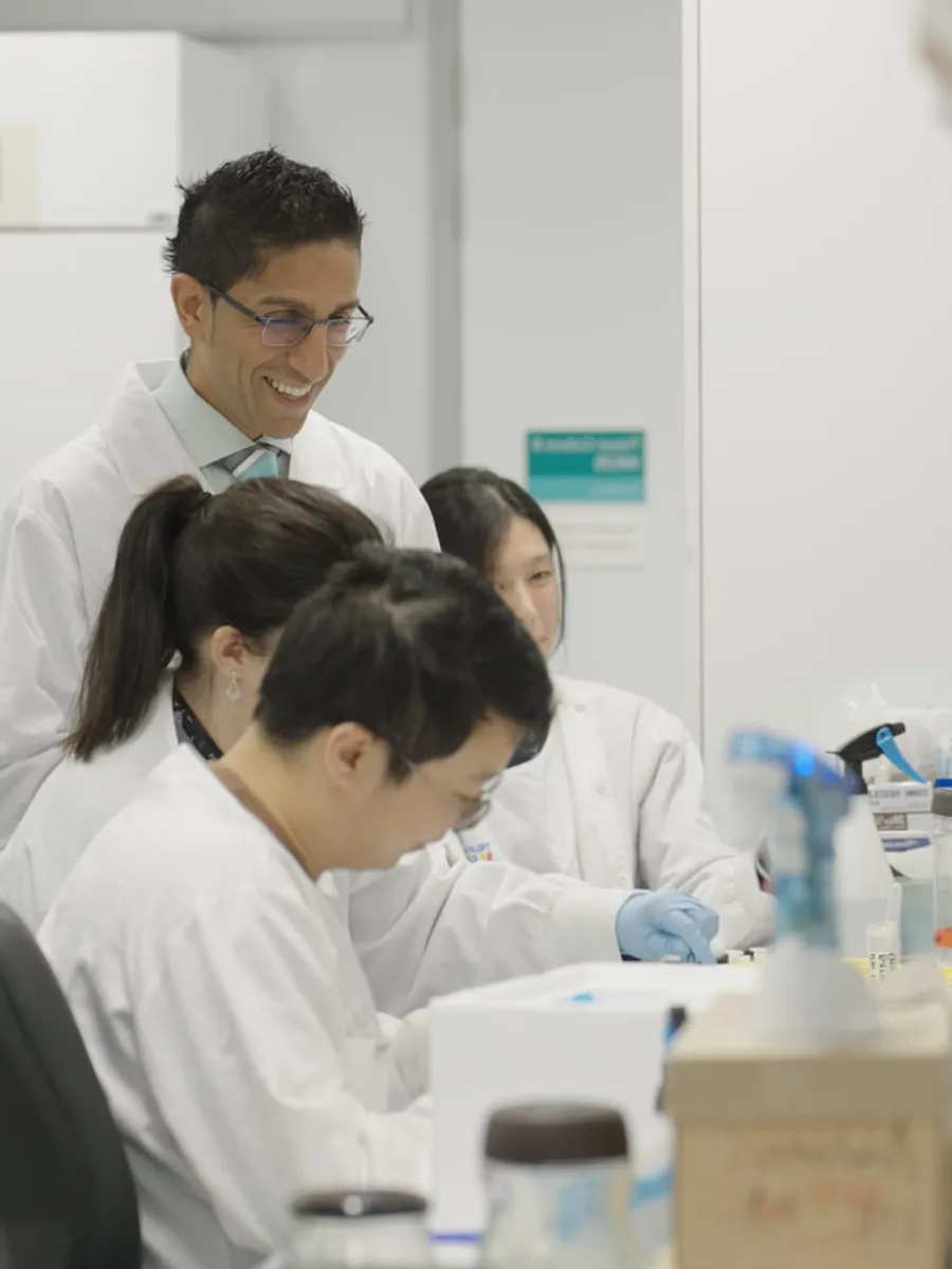 people working in a lab together